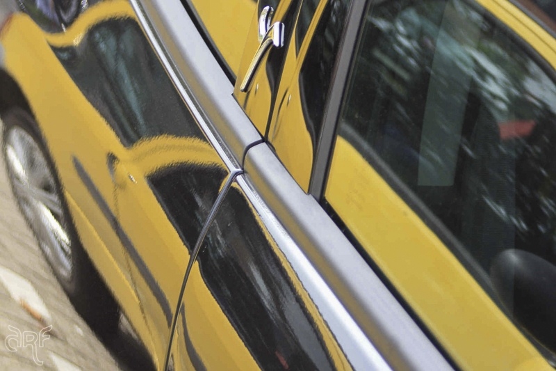 yellow reflection in car