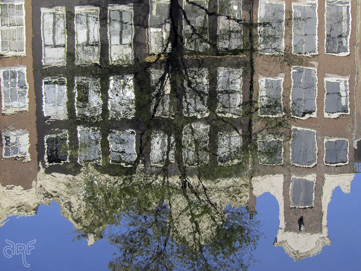 reflection of Amsterdam canal houses 
