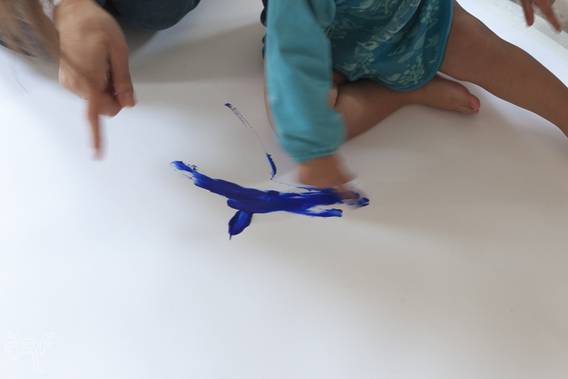 toddler painting with fingers