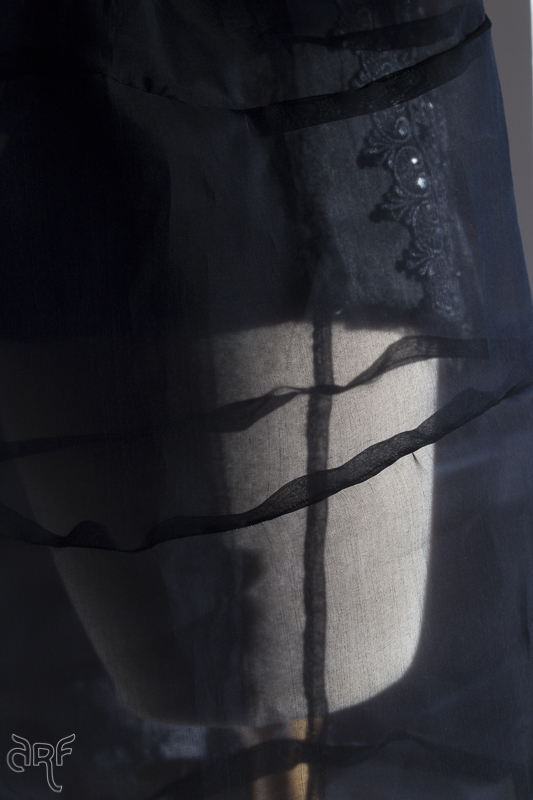 see-through sleeves of black silk