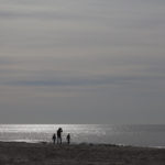 three people on beach