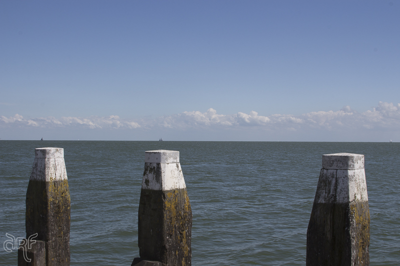 view on Waddenzee with mooring dolphins