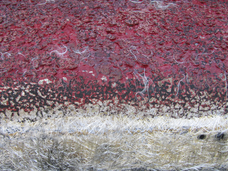 red and white boat hull
