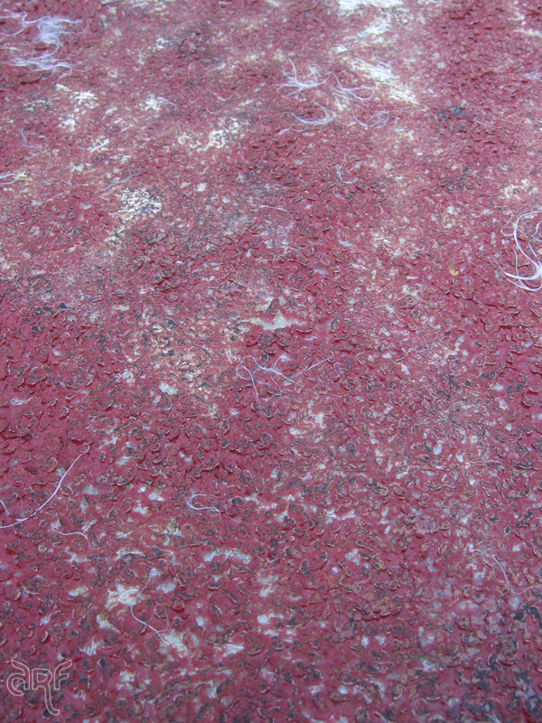 red texture on boat hull