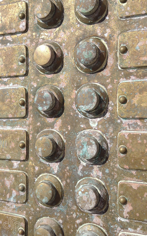 pattern of copper door bells in Venice, Italy