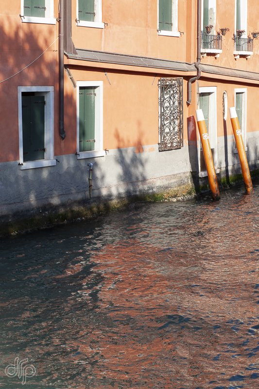 reflection of orange building, Venice Italy