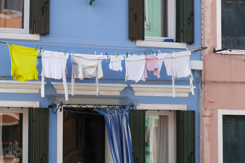 laundry at a blue house in Burano, Italy