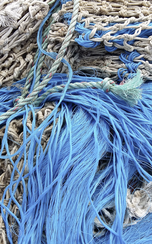 blue and green ropes with fishing nets