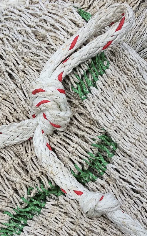 fishing nets with green and red details