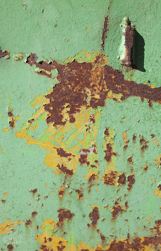 green surface with rust