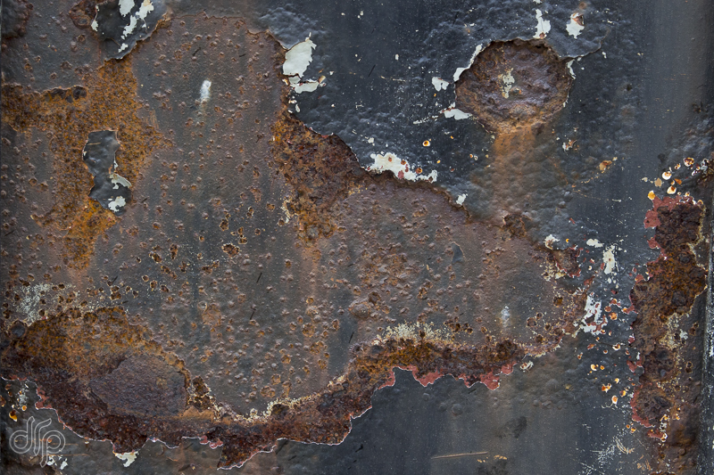 black surface with rust