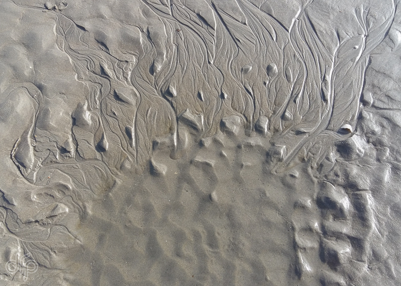 exploding wavy pattern in sand