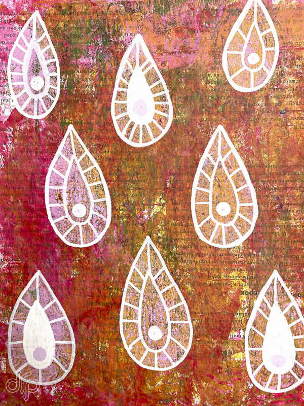 Gelli plate pattern with orange background and large white drops