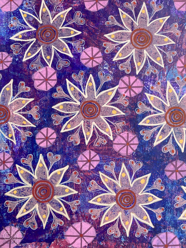 Gelli plate pattern with blue background and pinkish flowers